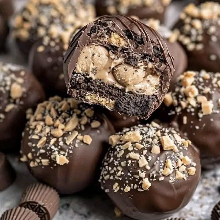 No-Bake Oreo Peanut Butter Truffles coated in chocolate, rich and creamy dessert balls perfect for easy homemade treats.