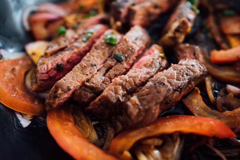 Beef Fajita Skillet with juicy steak, bell peppers, and onions